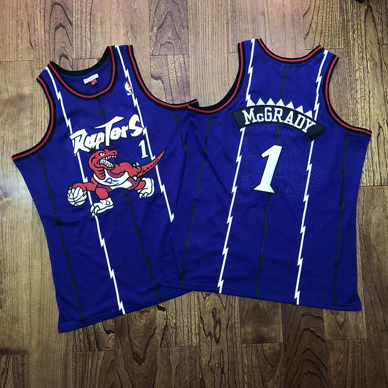 Regata NBA Mitchell & Ness Raptors 1998/99 Retro Macgrady #1 Regata NBA Mitchell & Ness Raptors 1998/99 Retro Macgrady #1