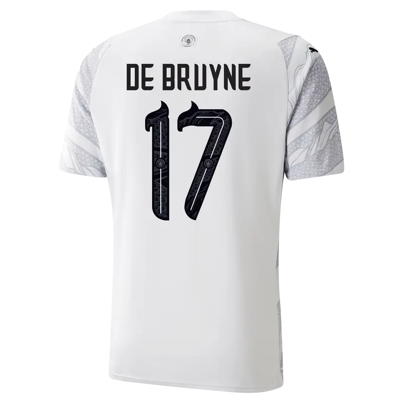 Camisa Manchester City Branca De Bruyne #17 Dragão de Madeira 2024/25 Camisa Manchester City Branca De Bruyne #17 Dragão de Madeira 2024/25