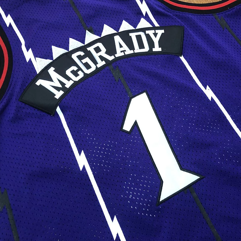 Regata NBA Mitchell & Ness Raptors 1998/99 Retro Macgrady #1 Regata NBA Mitchell & Ness Raptors 1998/99 Retro Macgrady #1