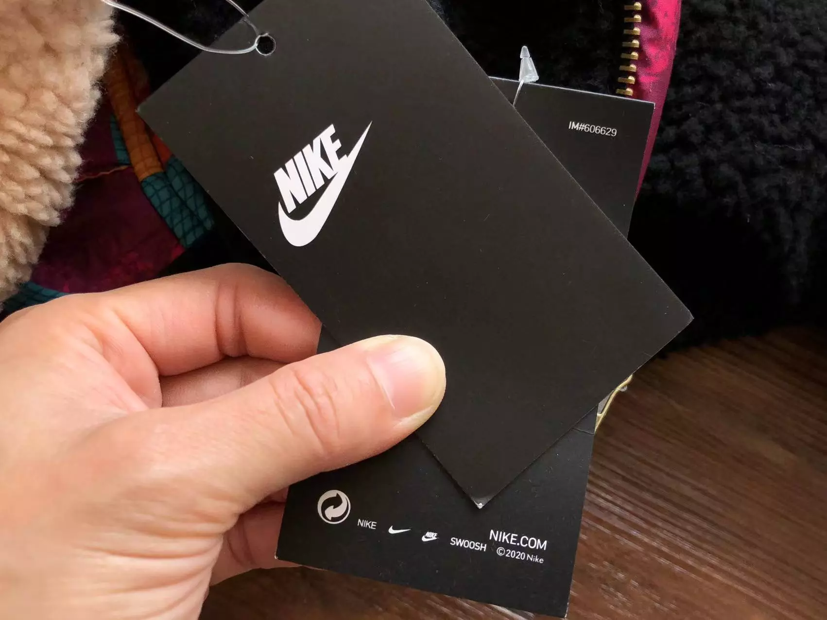 Casaco de Frio Nike Lã Reversível Preto/Bege Leap High Just do It Casaco de Frio Nike Lã Reversível Preto/Bege Leap High Just do It