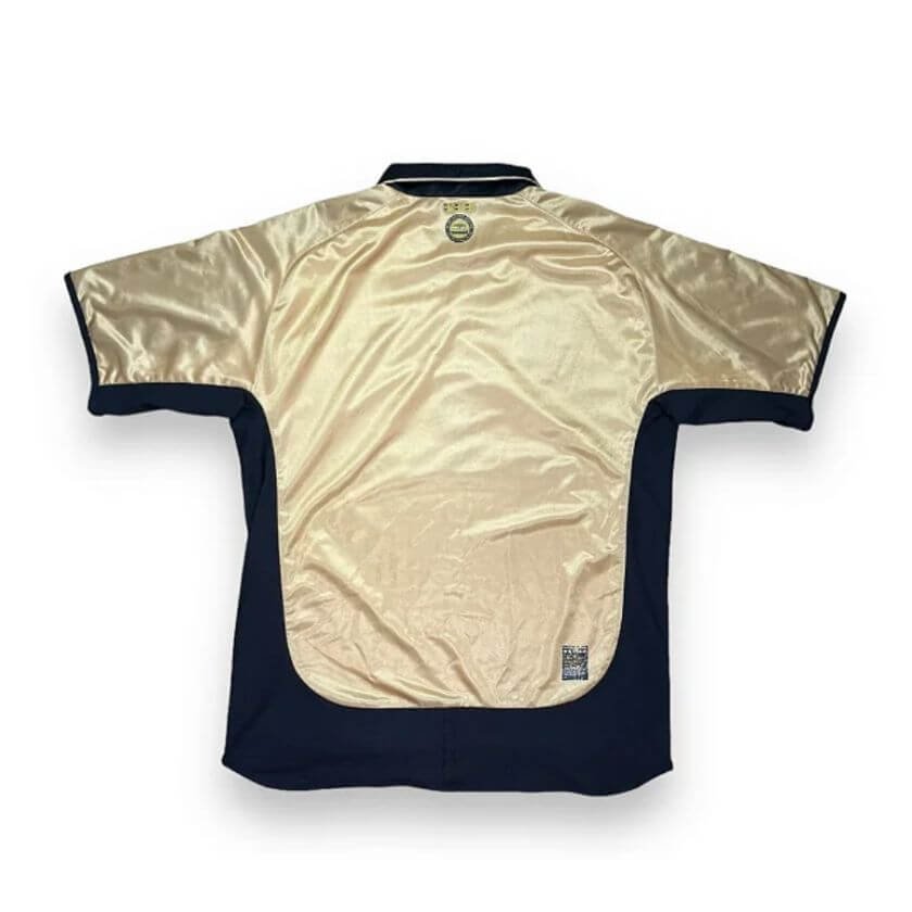 Camisa Man Utd Reversível Dourada/Branca Retrô 2001 100 Anos Camisa Man Utd Reversível Dourada/Branca Retrô 2001 100 Anos