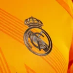 camisa-real-madrid-reserva-ii-laranja-away-2024-25-jogador-loja-malta-esportes (1)