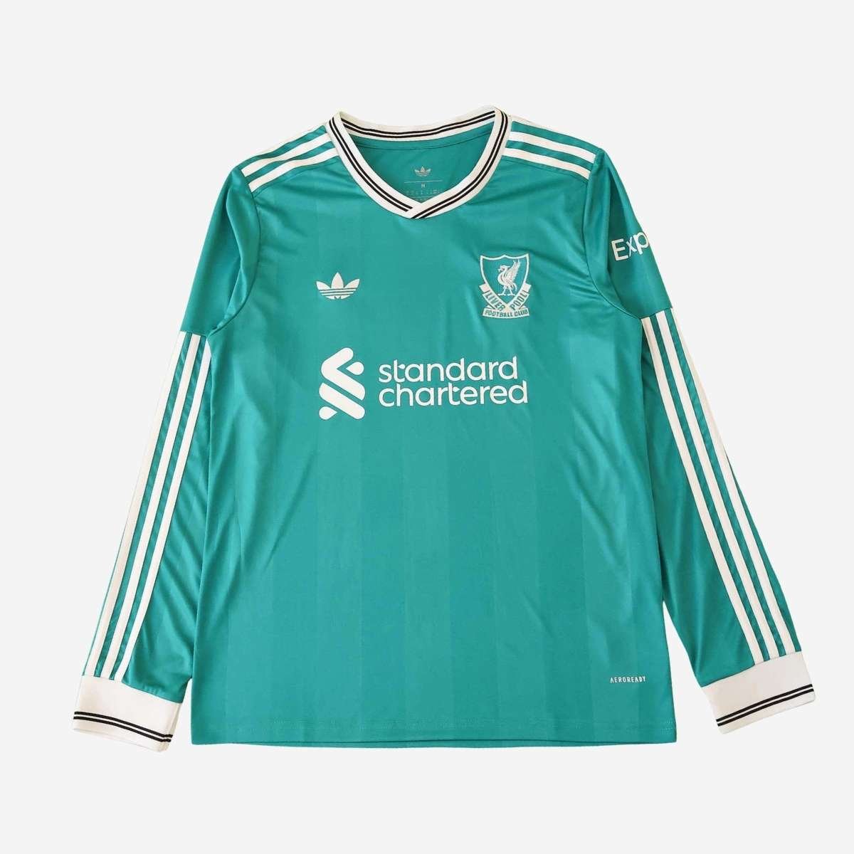 Kit-infantil-Liverpool-verde-2025-26-third-manga-longa (2) Kit Infantil Liverpool Verde 2025/26 Home Manga Longa