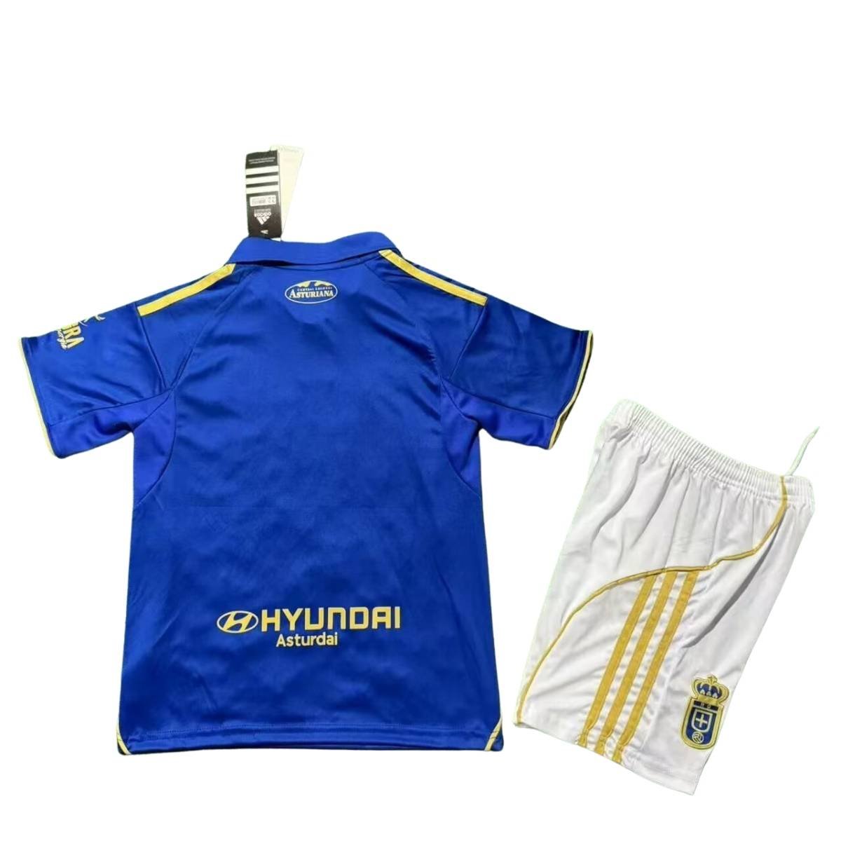 Kit-infantil-Oviedo-Azul-e-Dourado-25-26-Home-Unissex (2) Kit Infantil Real Oviedo Azul 2025/26 Home Unissex