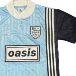 camisa-adidas-oasis-1996-Bolt-Makers-Arms-azul-claro-