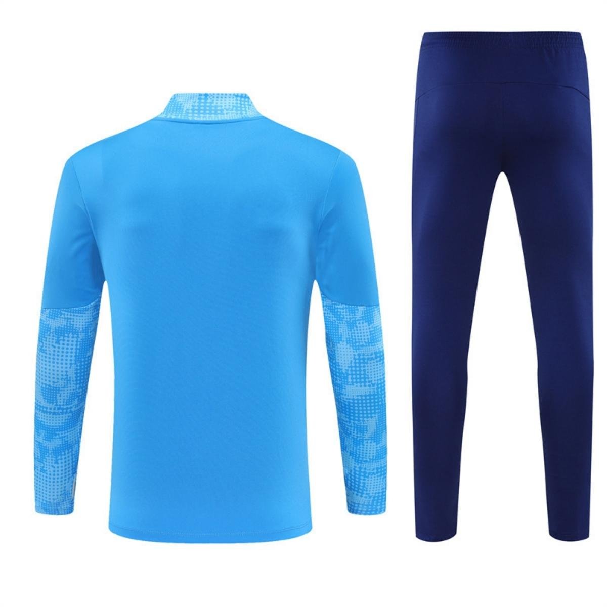kit-treino-manchester-city-2025-26-cinza-azul-masculino (1) Conjunto Treino Manchester City Calça e Jaqueta Azul 2025/26 Masculino