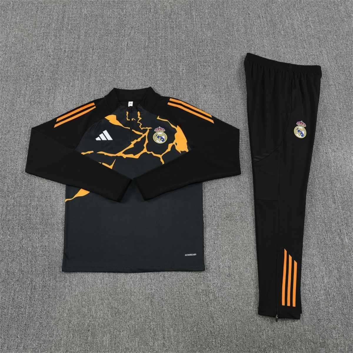 kit-treino-real-madrid-2025-26-preto-laranja-masculino (3) Conjunto Treino Real Madrid Calça e Jaqueta Preto/Laranja 2025/26 Masculina